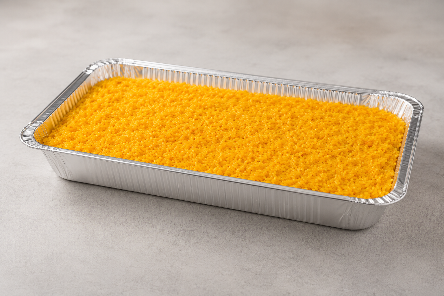 Full catering tray of seasoned yellow rice
